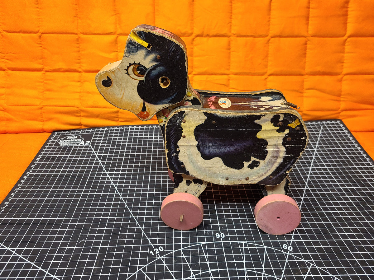 Fisher price store cow pull toy