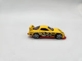 24/Seven 1/64 die-cast loose Hot Wheels yellow  racer with black flames.